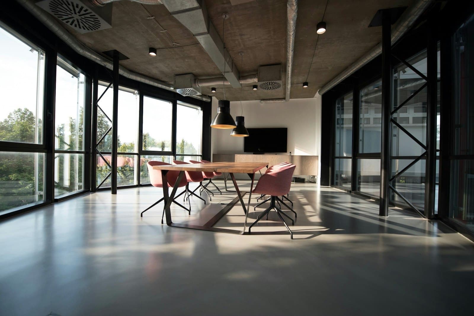 Modern office meeting room with a long table