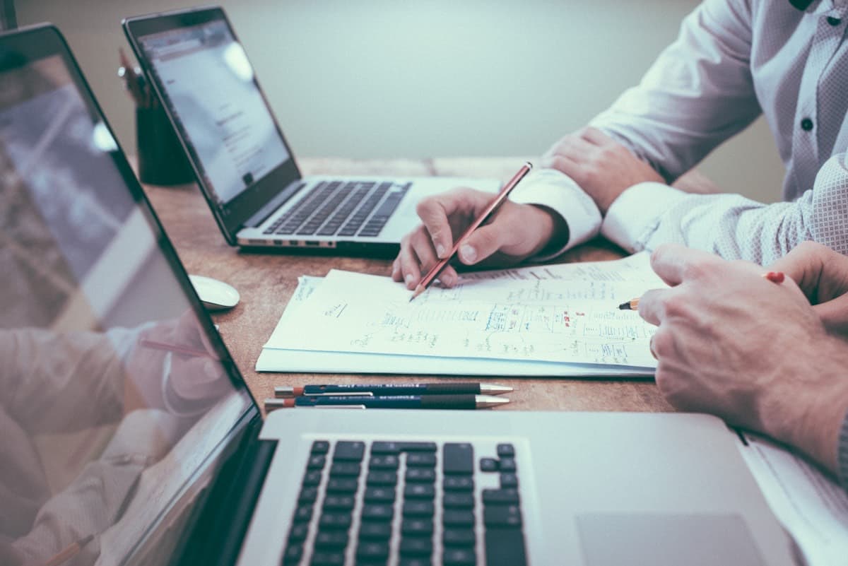 Accountants reviewing financial documents with a client